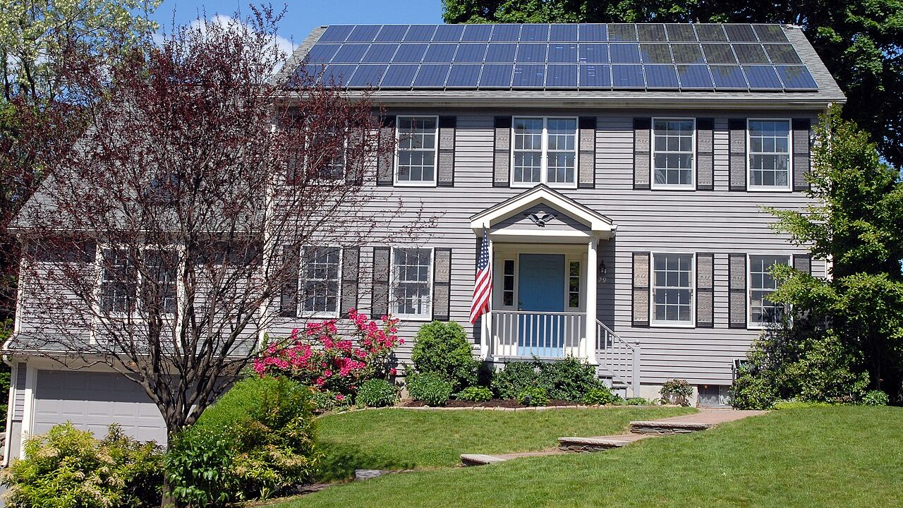 Rooftop solar photovoltaic panels on a family home