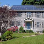 Rooftop solar photovoltaic panels on a family home