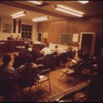 Residents attending a city council meeting