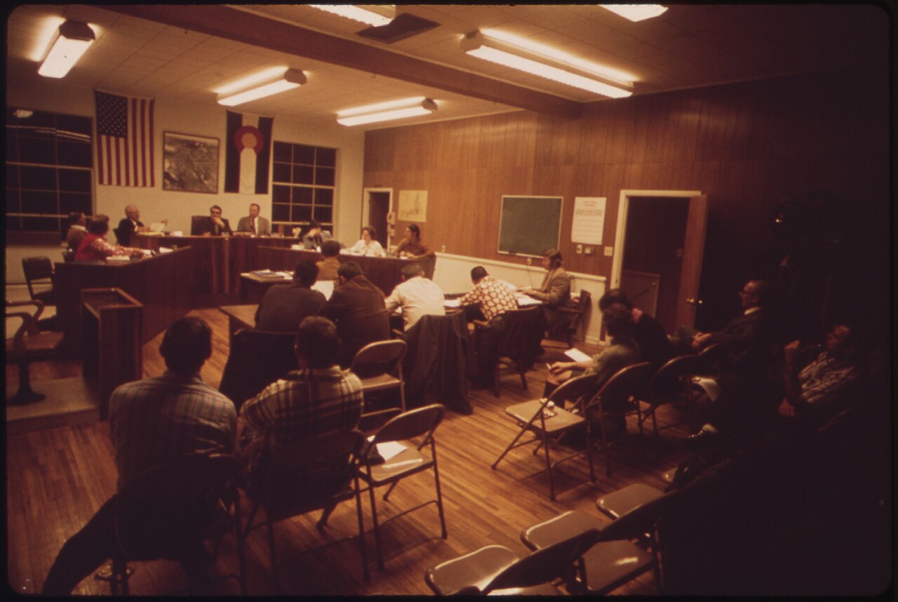 Residents attending a city council meeting